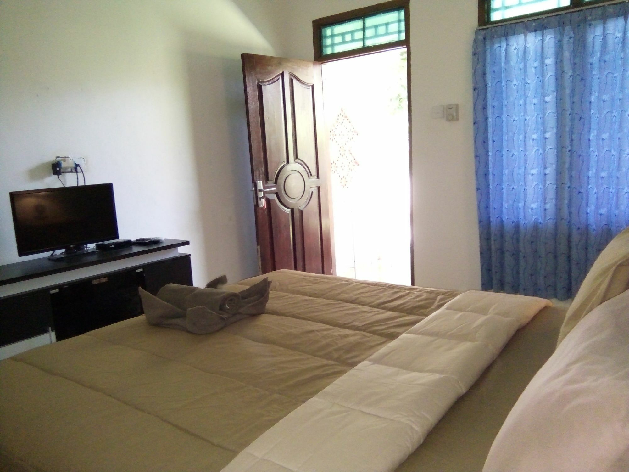 Family Garden Homestay Mangsit ภายนอก รูปภาพ
